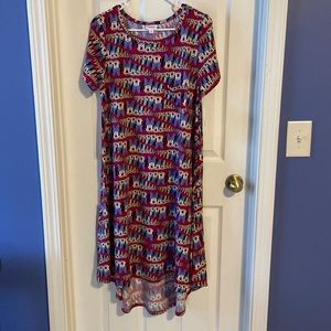 New with tags LuLaRoe Disney dress, Size Medium.
